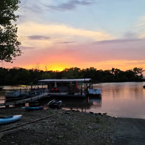 a boat parked next to a body of water