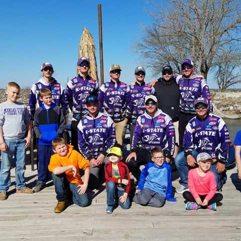 a group of people posing for the camera