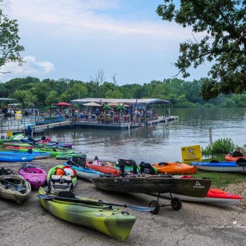 a boat is docked at the beach