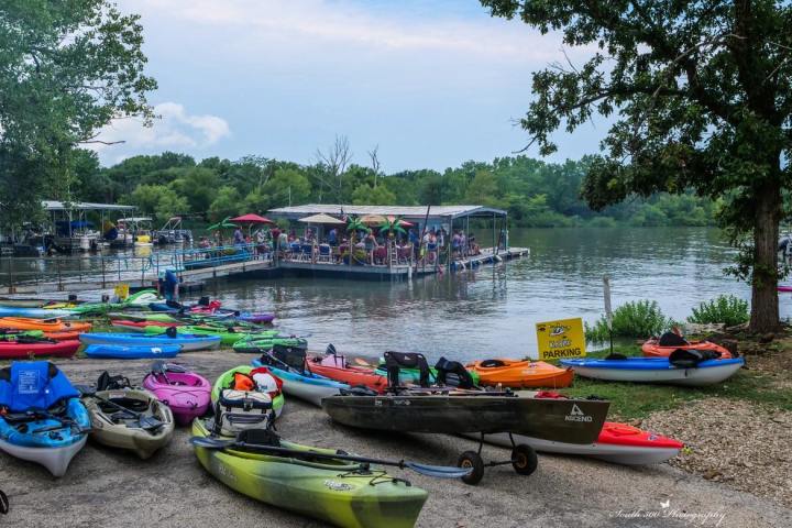 a boat is docked at the beach