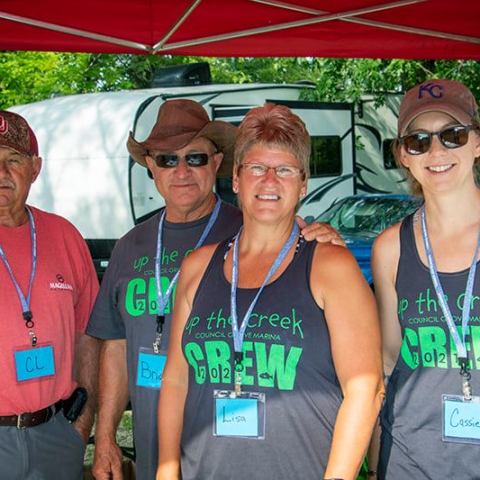 a group of people posing for the camera
