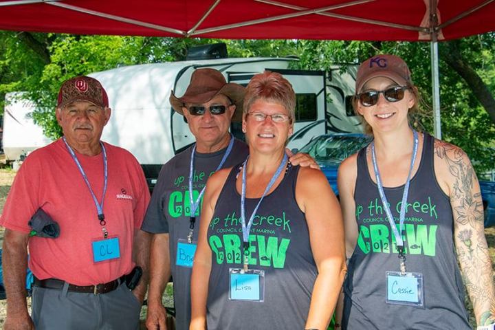 a group of people posing for the camera
