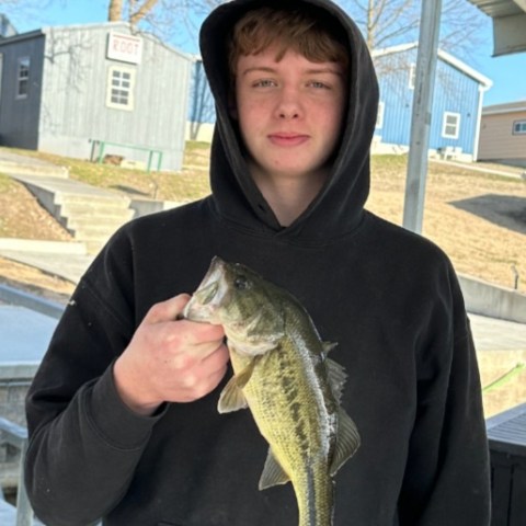 a person holding a fish